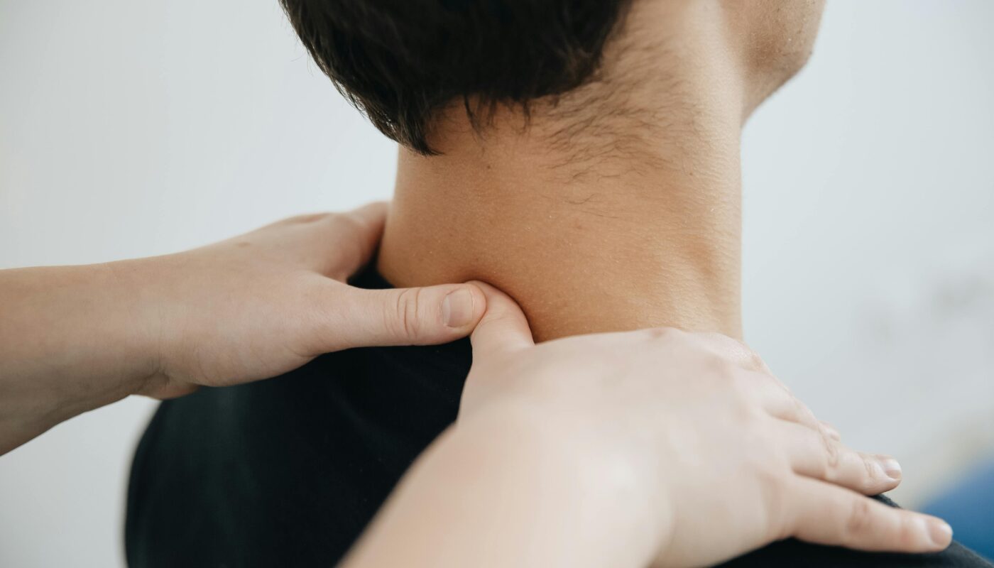 Photo by Funkcinės Terapijos Centras: https://www.pexels.com/photo/patients-neck-massaged-by-a-physiotherapist-20860604/