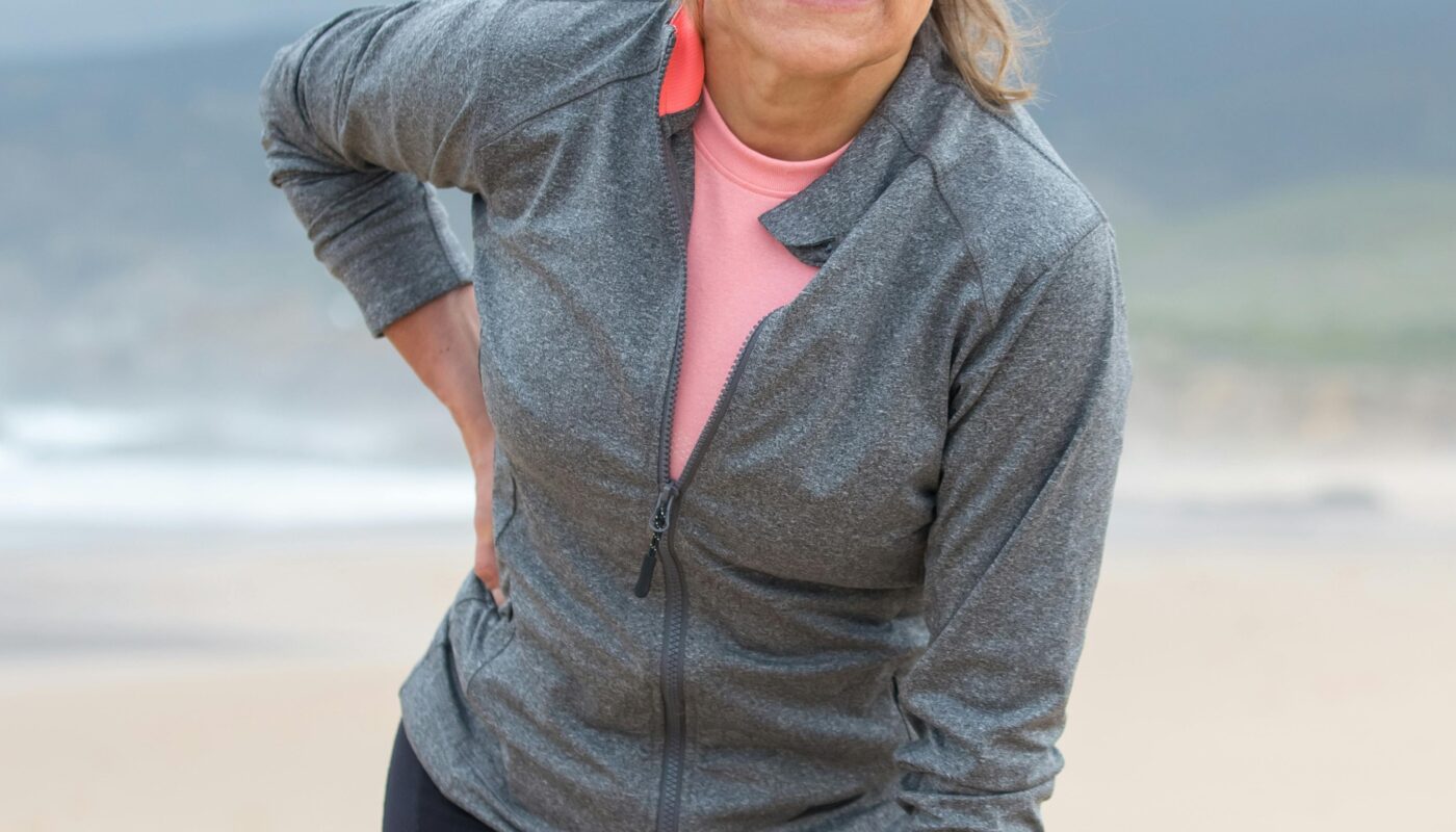 Photo by Kampus Production: https://www.pexels.com/photo/woman-in-gray-zip-up-jacket-and-black-leggings-standing-on-beach-8638040/