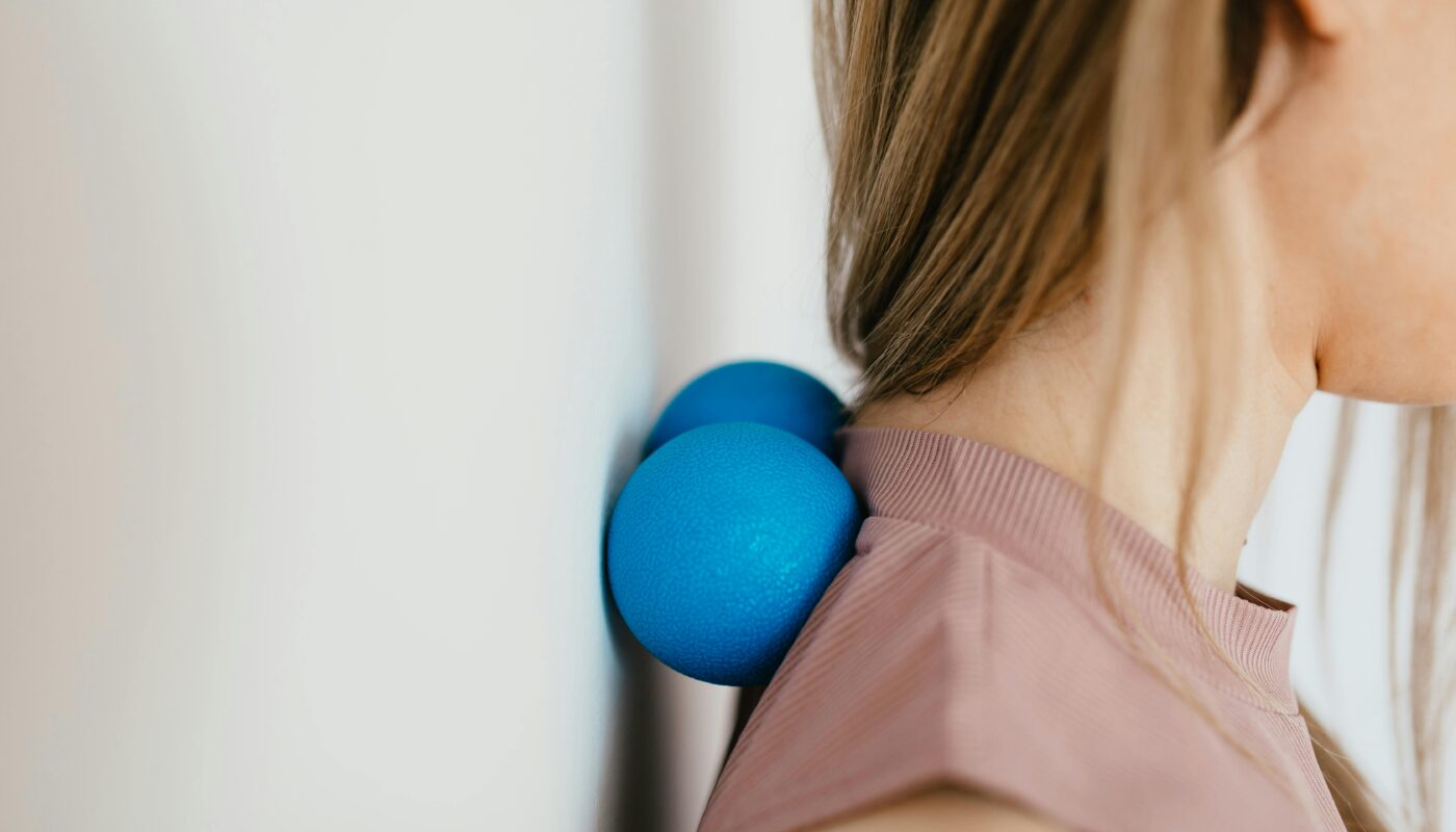 Photo by www.kaboompics.com: https://www.pexels.com/photo/close-up-photo-of-a-woman-pressing-her-neck-on-a-stress-ball-4498297/