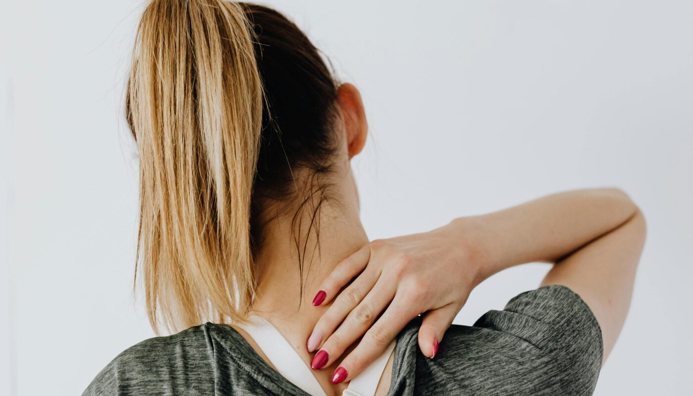 Photo by www.kaboompics.com: https://www.pexels.com/photo/back-view-of-a-woman-having-a-neck-pain-4506108/