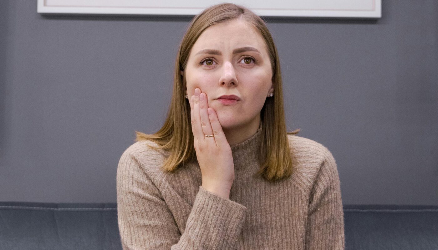 Photo by Pavel Danilyuk: https://www.pexels.com/photo/woman-in-gray-sweater-smiling-6193200/