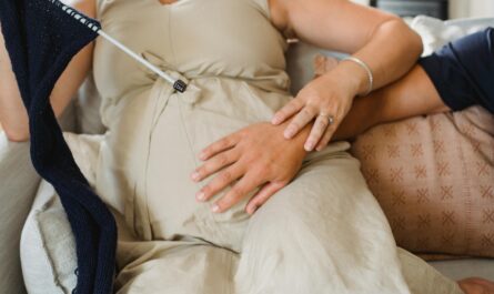 Photo by Amina Filkins: https://www.pexels.com/photo/crop-pregnant-woman-with-husband-on-couch-5424643/