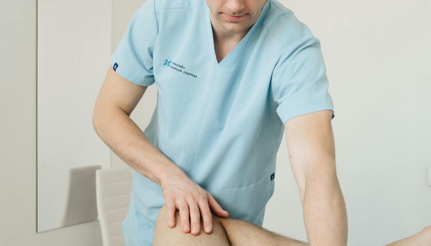Photo by Funkcinės Terapijos Centras: https://www.pexels.com/photo/physiotherapist-massaging-leg-and-hip-20860597/