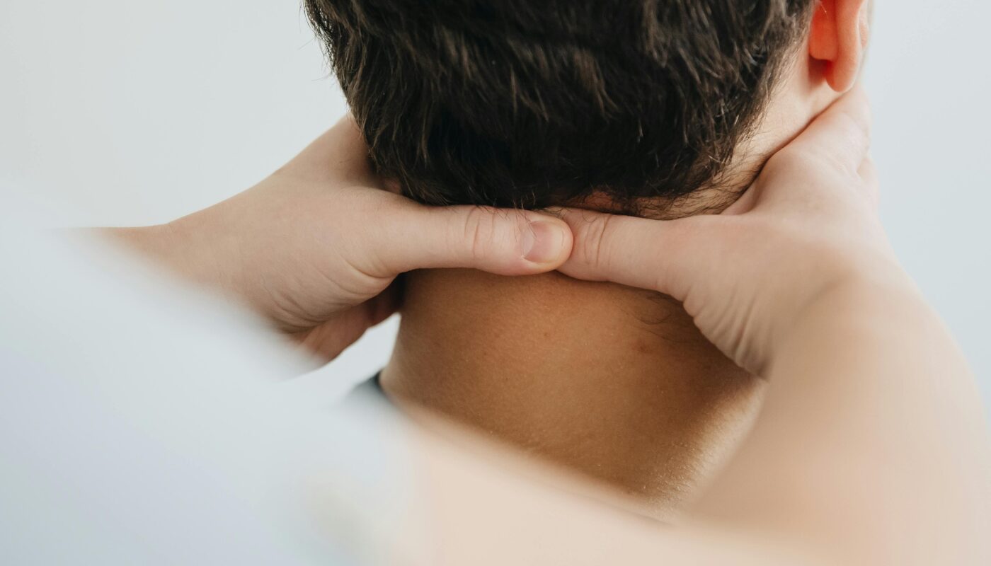 Photo by Funkcinės Terapijos Centras: https://www.pexels.com/photo/physiotherapist-massaging-neck-20860611/