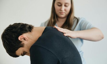 Photo by Funkcinės Terapijos Centras: https://www.pexels.com/photo/physiotherapist-helping-a-patient-exercise-his-back-20860615/