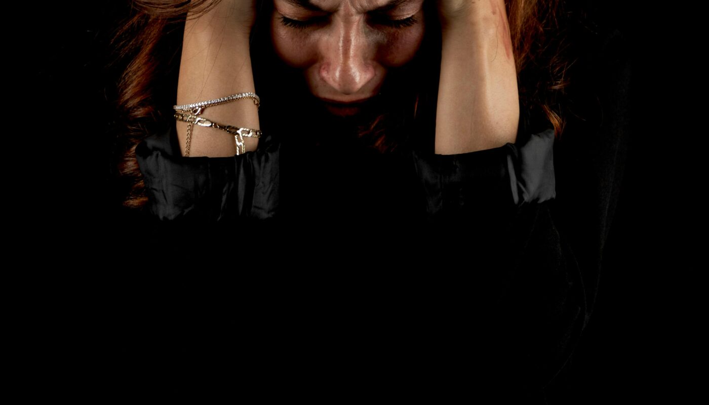 Photo by İbrahim Halil Ölmez: https://www.pexels.com/photo/woman-in-emotional-distress-holding-head-29965352/