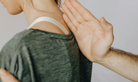 Photo by www.kaboompics.com: https://www.pexels.com/photo/crop-faceless-chiropractor-checking-up-back-of-female-patient-4506076/