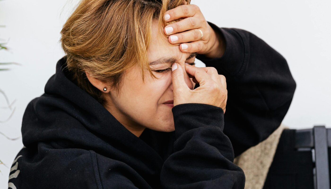 Photo by www.kaboompics.com: https://www.pexels.com/photo/a-woman-feeling-pain-on-her-nose-5207352/