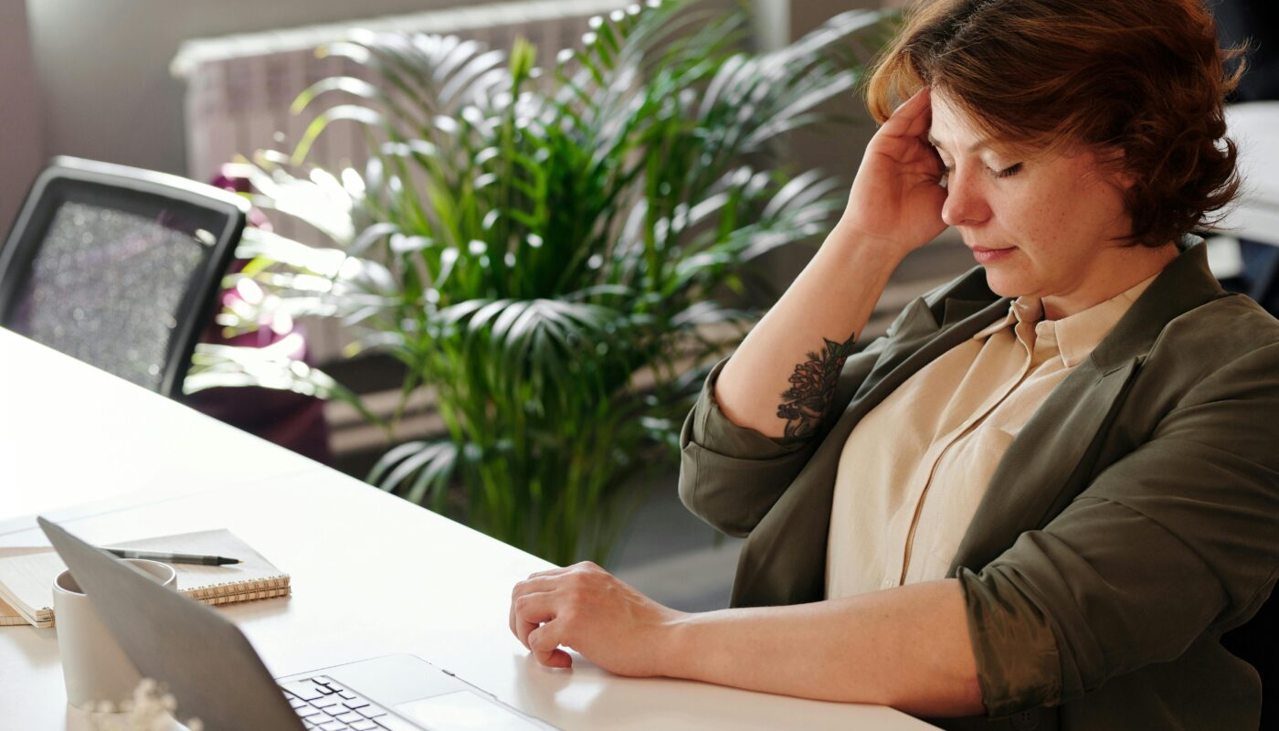 Photo by Marcus Aurelius: https://www.pexels.com/photo/photo-of-woman-holding-her-head-4064177/
