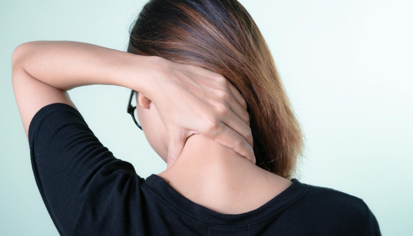 Photo by Picas Joe: https://www.pexels.com/photo/a-woman-holding-her-neck-11352554/