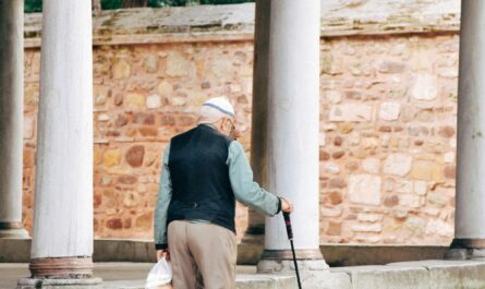 Photo by Selenay Yıldırım: https://www.pexels.com/photo/senior-in-vest-with-walking-stick-on-sidewalk-in-town-25435895/