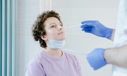 Photo by SHVETS production: https://www.pexels.com/photo/a-woman-getting-a-swab-test-8413191/