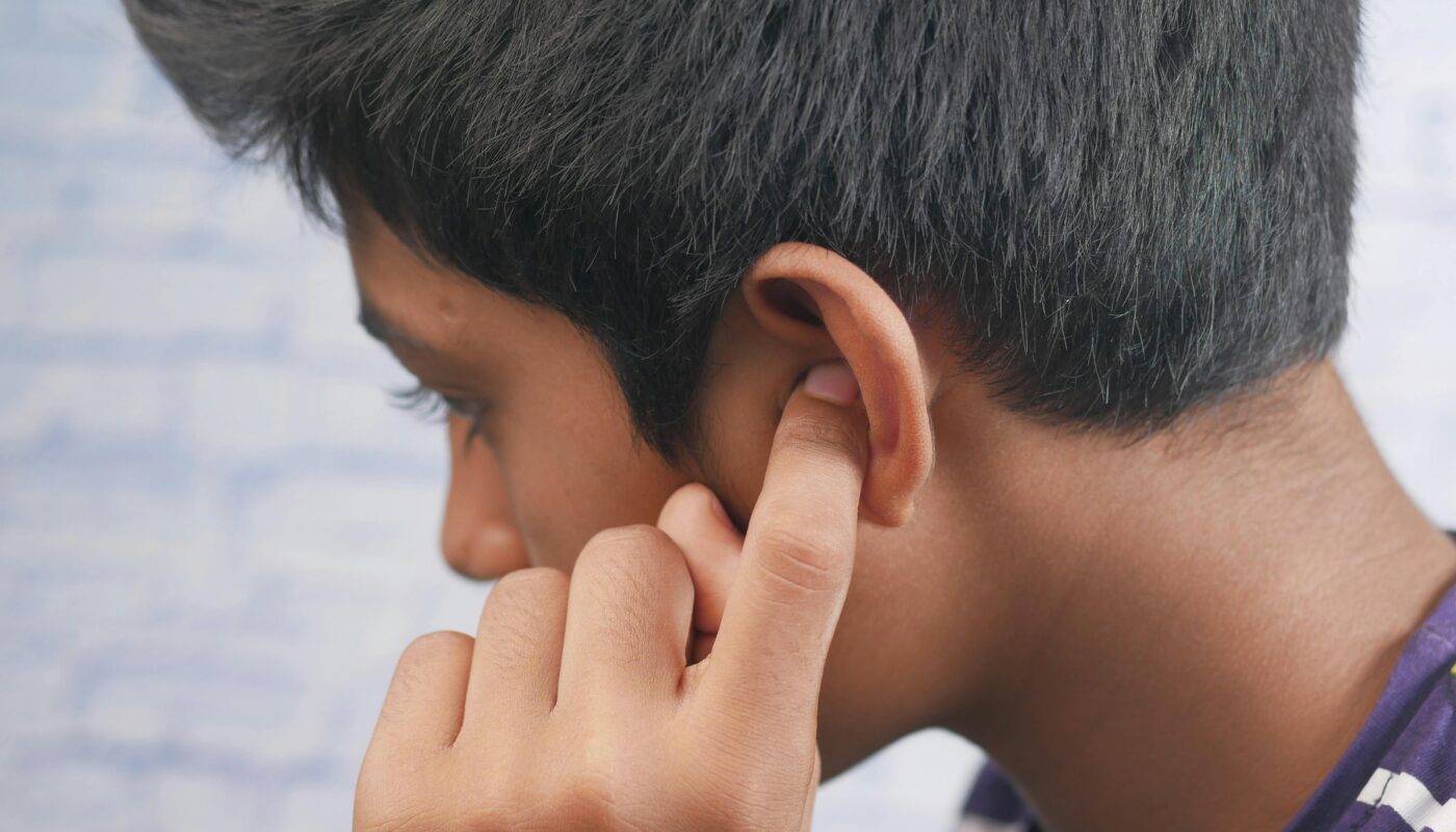 Photo by Towfiqu barbhuiya: https://www.pexels.com/photo/a-boy-covering-his-ear-13308389/