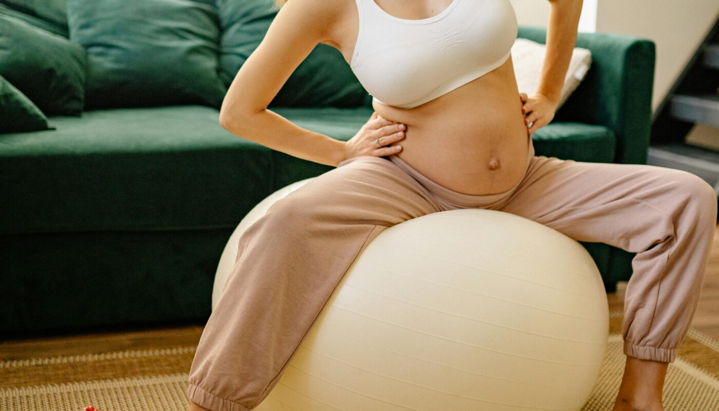 Photo by Yan Krukau: https://www.pexels.com/photo/pregnant-woman-doing-excercise-7155524/
