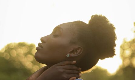 Photo by Charles Awelewa: https://www.pexels.com/photo/peaceful-woman-posing-in-natural-sunlight-outdoors-29676645/