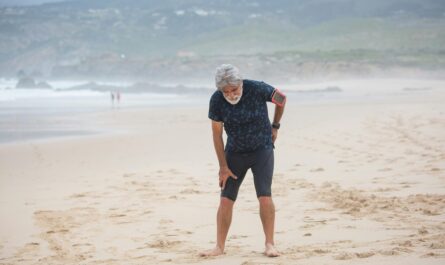 Photo by Kampus Production: https://www.pexels.com/photo/tired-elderly-man-standing-on-the-beach-sand-8638038/