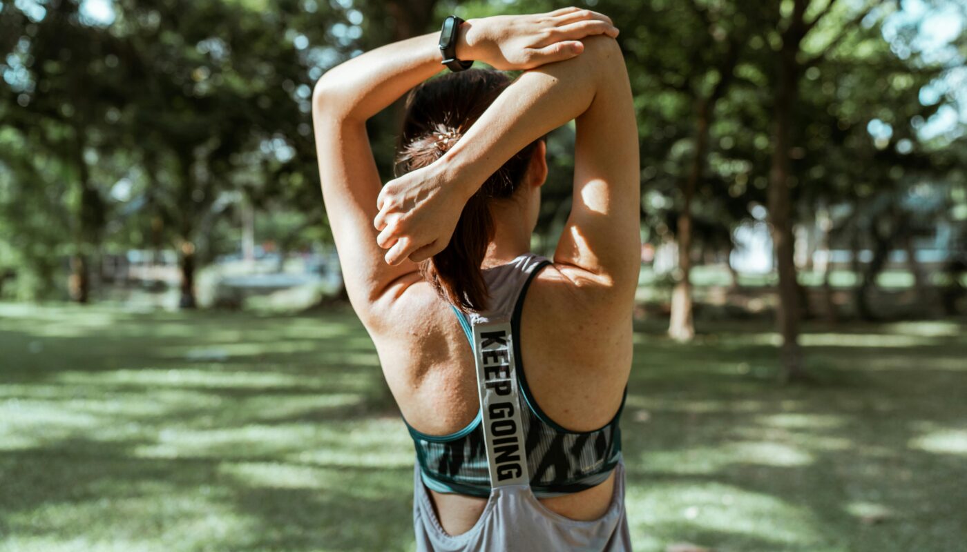 Photo by Ketut Subiyanto: https://www.pexels.com/photo/unrecognizable-female-athlete-stretching-muscles-of-arms-and-back-4426321/