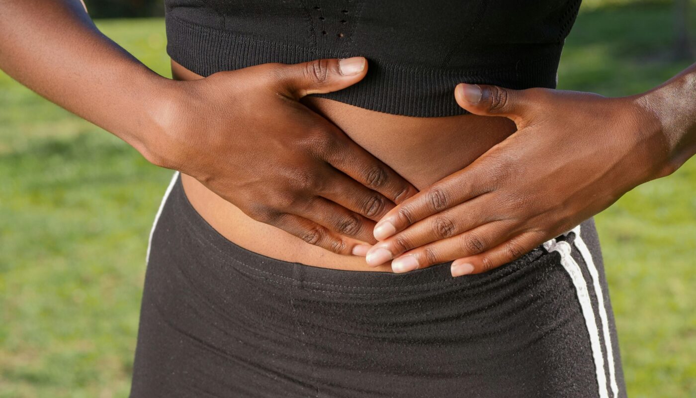 Photo by Kindel Media: https://www.pexels.com/photo/close-up-photo-of-woman-touching-her-abdomen-7298668/