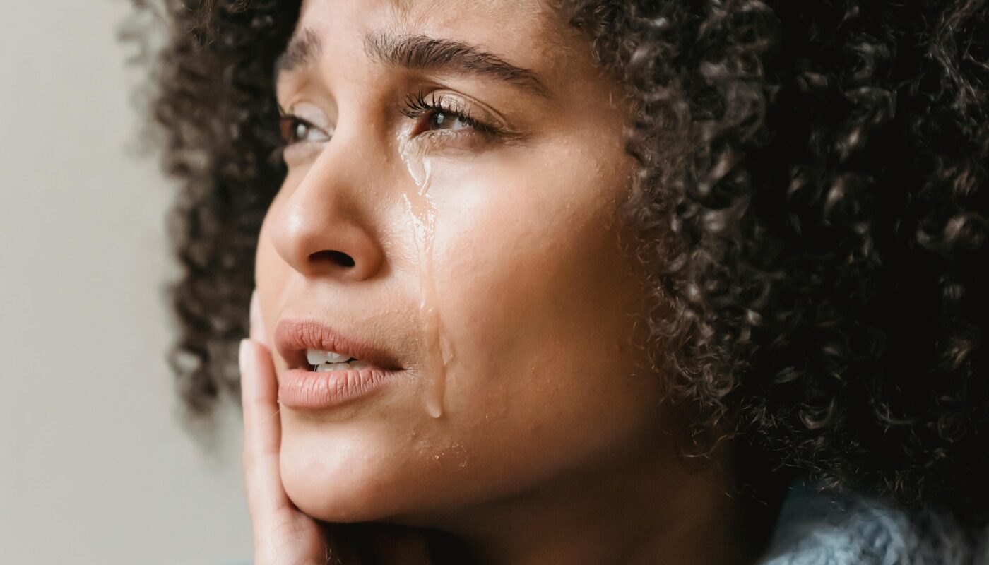 Photo by Liza Summer: https://www.pexels.com/photo/thoughtful-ethnic-woman-with-tears-on-face-6383217/