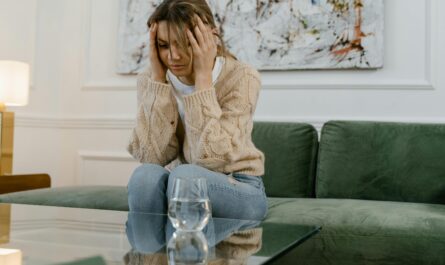 Photo by MART PRODUCTION: https://www.pexels.com/photo/a-sad-woman-sitting-on-a-sofa-7699423/