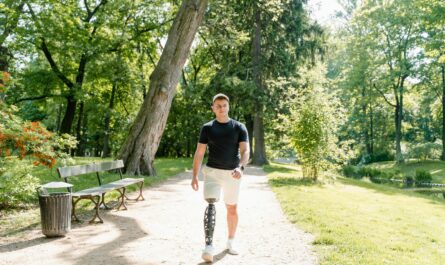Photo by MART PRODUCTION: https://www.pexels.com/photo/a-man-with-prosthetic-leg-walking-in-the-park-8436890/
