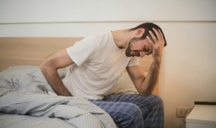 Photo by Andrea Piacquadio: https://www.pexels.com/photo/young-man-in-sleepwear-suffering-from-headache-in-morning-3771115/