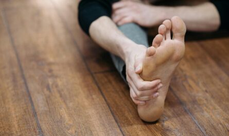Photo by Pavel Danilyuk: https://www.pexels.com/photo/person-stretching-at-gym-on-wooden-floor-6926012/