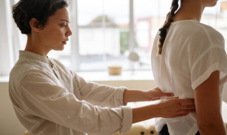 Photo by Yan Krukau: https://www.pexels.com/photo/physiotherapist-touching-womans-back-5793653/