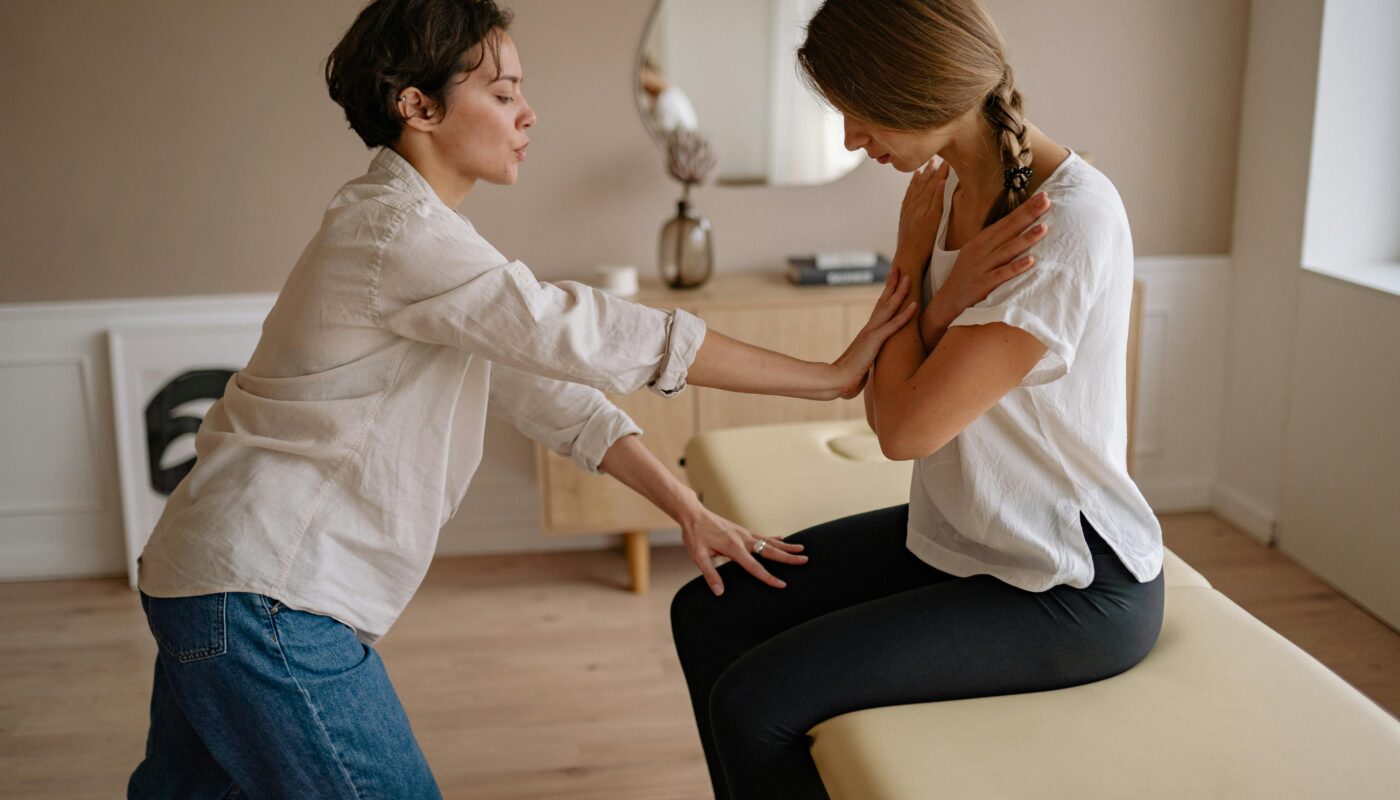Photo by Yan Krukau: https://www.pexels.com/photo/a-patient-sitting-on-the-therapy-bed-in-front-of-a-therapist-5793901/