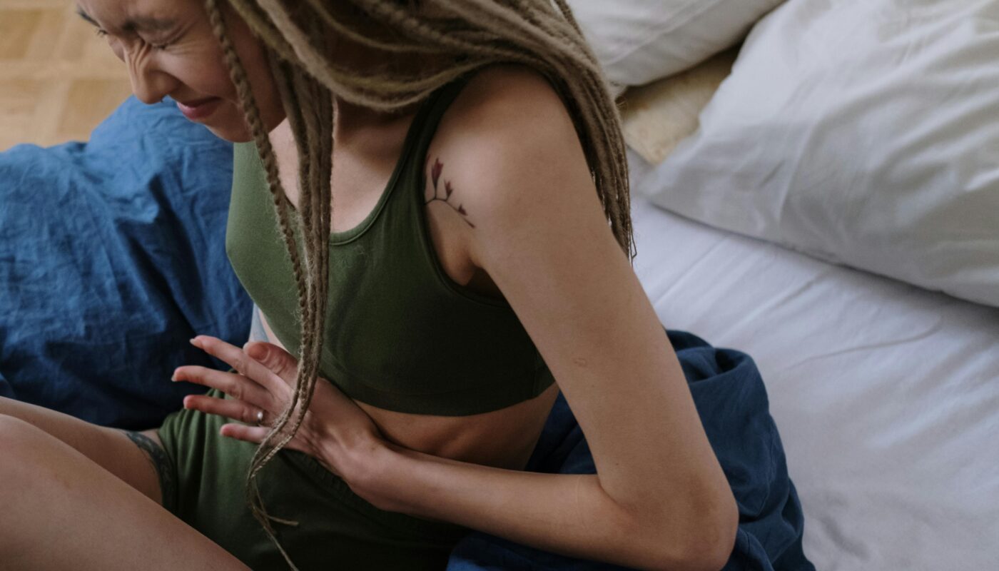 Photo by cottonbro studio: https://www.pexels.com/photo/woman-suffering-from-a-stomach-pain-6542686/