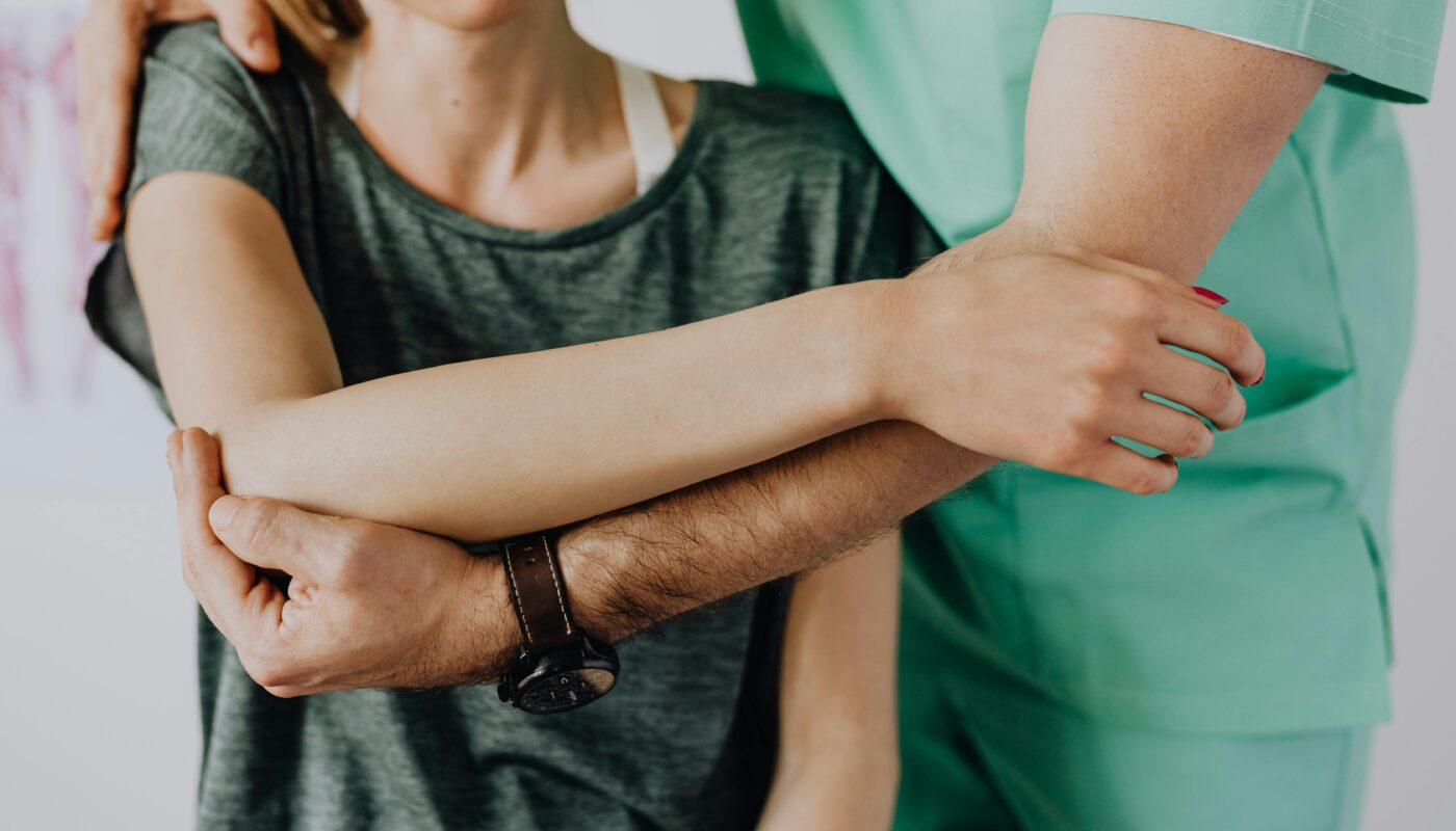 Photo by www.kaboompics.com: https://www.pexels.com/photo/crop-unrecognizable-orthopedist-stretching-shoulder-of-female-patient-4506169/