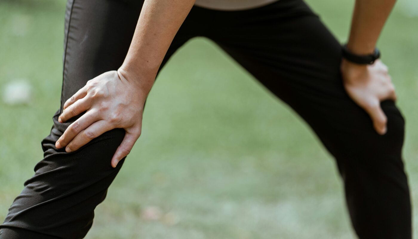 Photo by Ketut Subiyanto: https://www.pexels.com/photo/crop-sportsperson-resting-after-training-on-lawn-4426461/