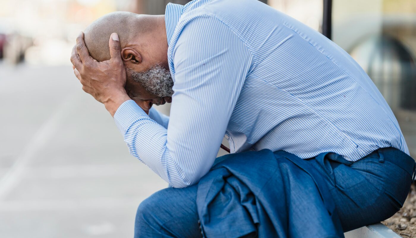 Photo by Nicola Barts : https://www.pexels.com/photo/man-touching-his-head-7927340/