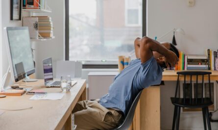 Photo by RDNE Stock project: https://www.pexels.com/photo/man-with-hands-in-hair-sitting-in-office-10376163/