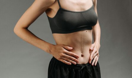 Photo by ROCKETMANN TEAM: https://www.pexels.com/photo/woman-in-black-sports-bra-and-black-skirt-9486598/