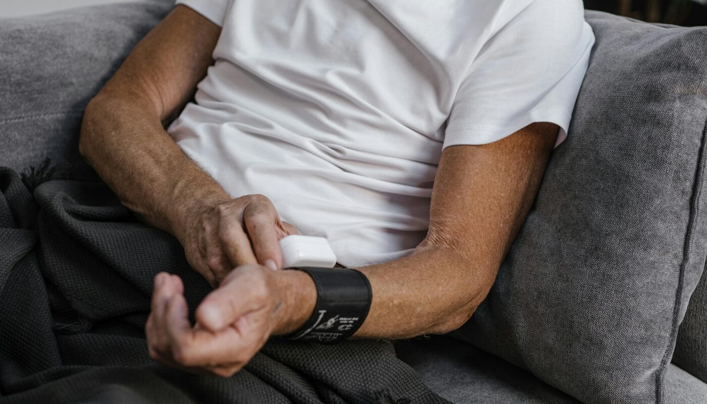 Photo by SHVETS production: https://www.pexels.com/photo/a-man-in-white-shirt-checking-his-blood-pressure-8900013/