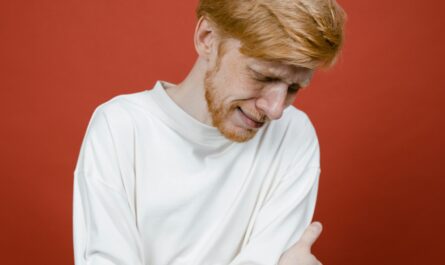 Photo by Tima Miroshnichenko: https://www.pexels.com/photo/man-in-white-long-sleeve-shirt-standing-near-red-wall-and-crying-8727345/