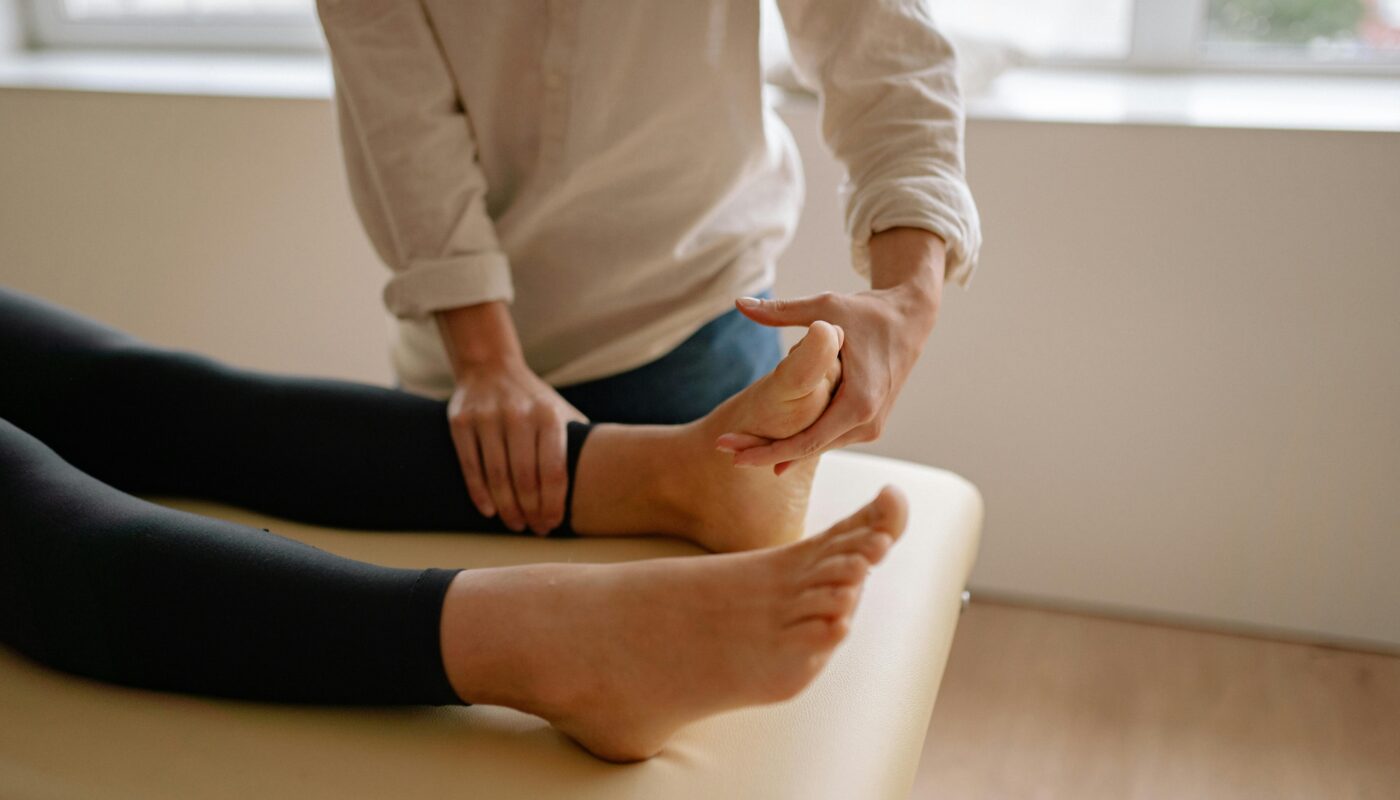Photo by Yan Krukau: https://www.pexels.com/photo/a-massage-therapist-massaging-a-client-s-foot-5793898/