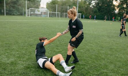 Photo by Anastasia Shuraeva: https://www.pexels.com/photo/a-tattooed-woman-helping-her-teammate-9517934/