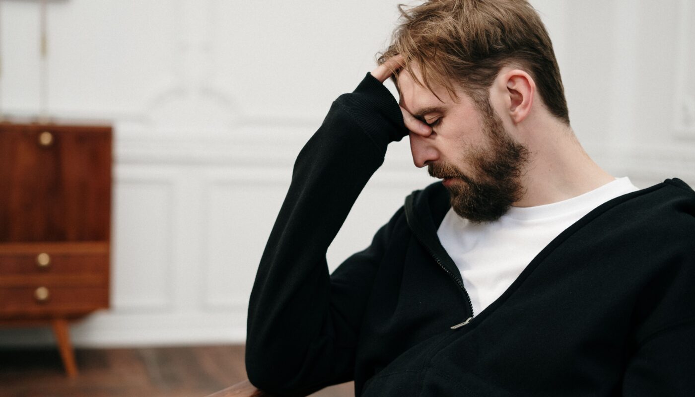 Photo by cottonbro studio: https://www.pexels.com/photo/man-in-black-blazer-sitting-on-chair-4101188/