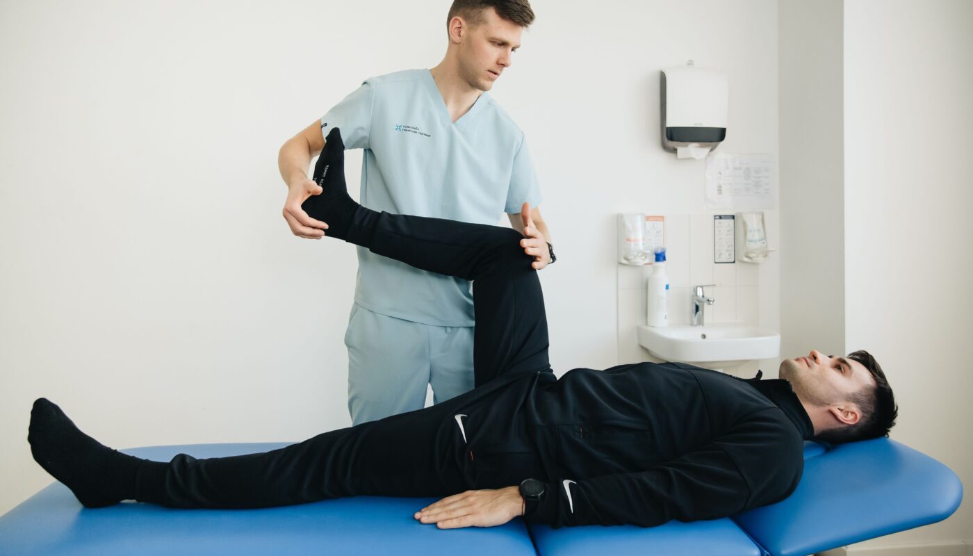 Photo by Funkcinės Terapijos Centras: https://www.pexels.com/photo/physiotherapist-and-patient-exercising-20860582/