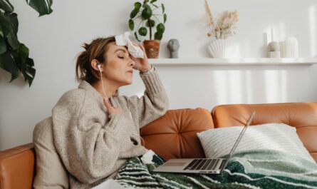 Photo by www.kaboompics.com: https://www.pexels.com/photo/woman-sitting-on-the-couch-wiping-her-sweat-with-tissue-7195033/