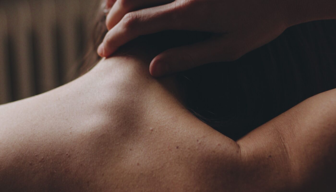 Photo by Margarita: https://www.pexels.com/photo/hand-on-neck-on-topless-body-15789874/