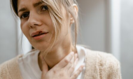 Photo by MART PRODUCTION: https://www.pexels.com/photo/woman-crying-while-touching-her-neck-7699307/
