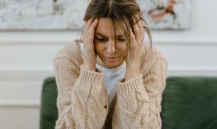 Photo by MART PRODUCTION: https://www.pexels.com/photo/a-sad-woman-sitting-on-a-sofa-7699482/