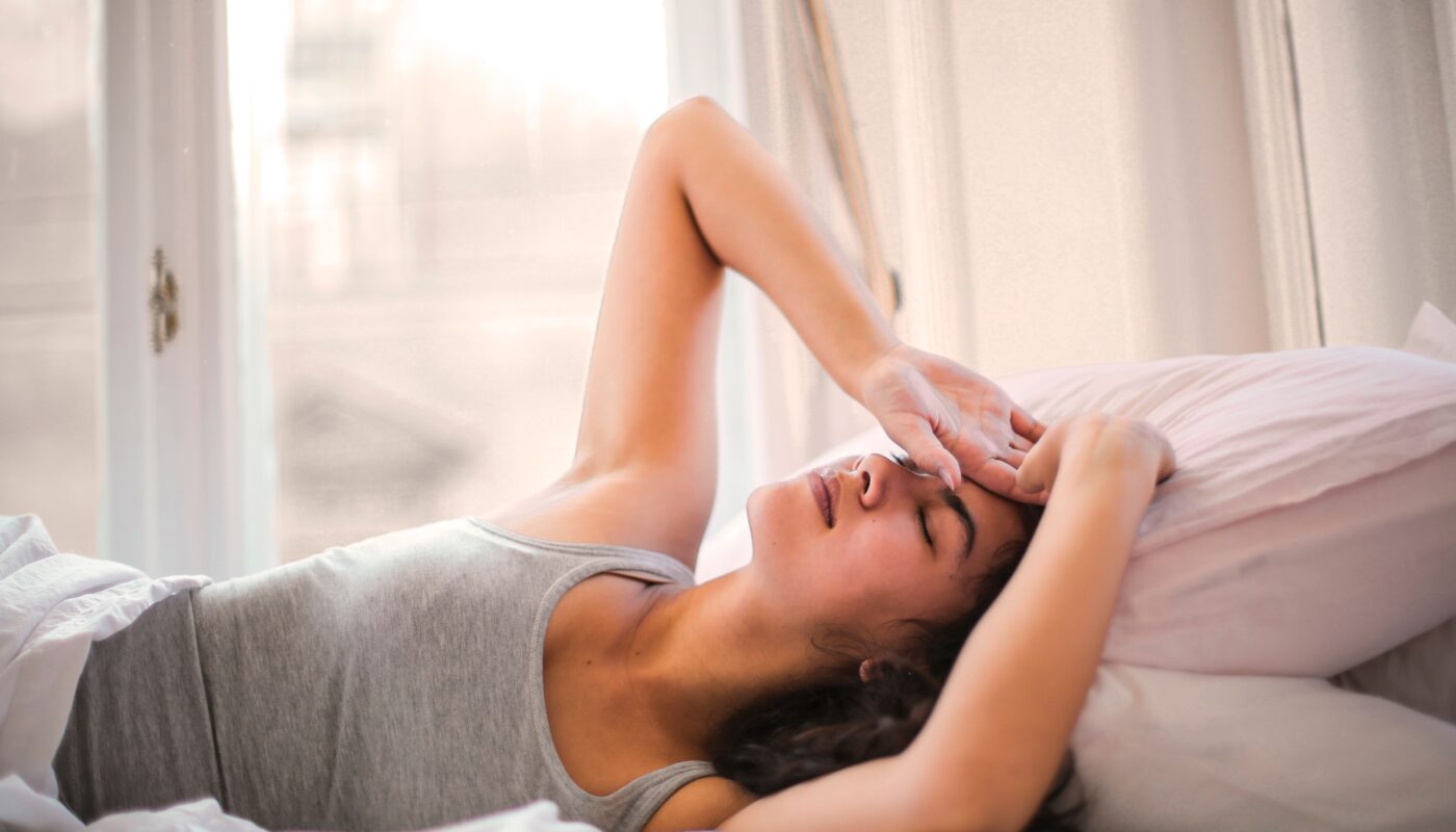Photo by Andrea Piacquadio: https://www.pexels.com/photo/woman-in-gray-tank-top-lying-on-bed-3768582/