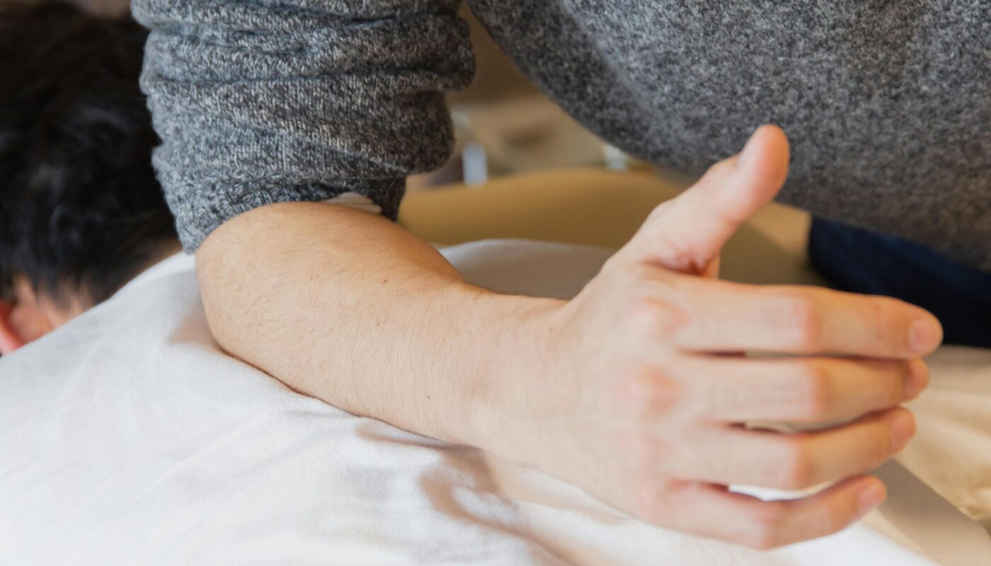Photo by Ryutaro Tsukata: https://www.pexels.com/photo/man-doing-massage-to-patient-lying-on-couch-5473179/