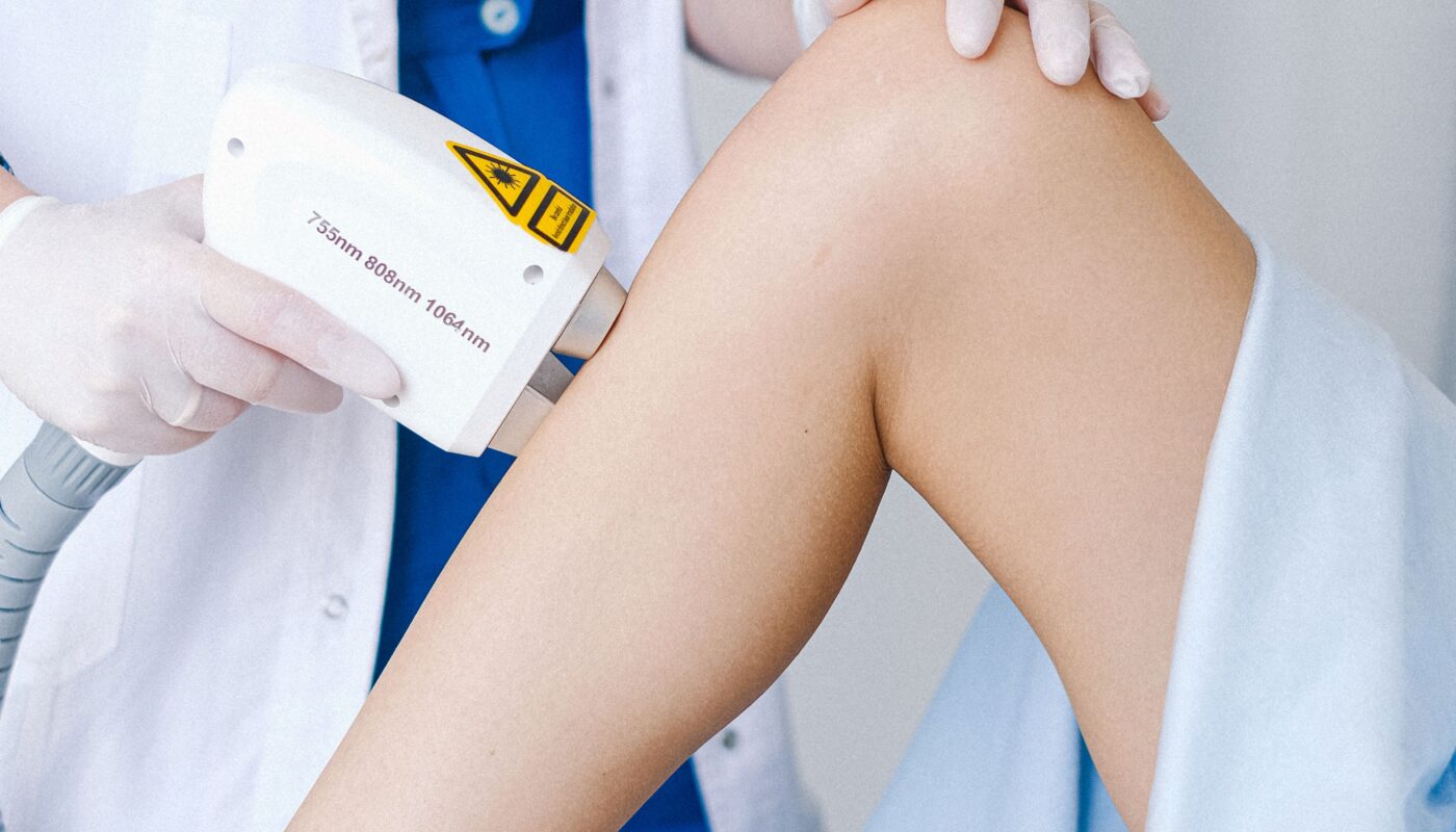 Photo by Anna Shvets: https://www.pexels.com/photo/cosmetologist-applying-low-level-laser-to-leg-of-patient-5069506/