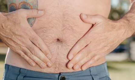 Photo by Kindel Media: https://www.pexels.com/photo/a-person-holding-his-stomach-7298442/