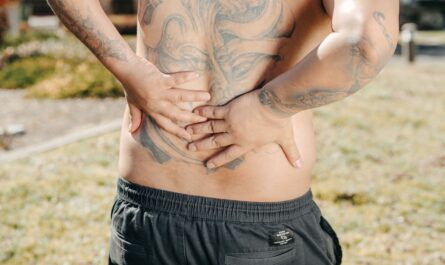 Photo by Kindel Media: https://www.pexels.com/photo/a-man-with-tattoos-on-his-back-7298610/
